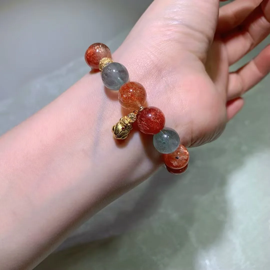 Arusha Sunstone Bracelet · Grey-Blue Beads & Ornate Charm · 12.2mm — detail photo