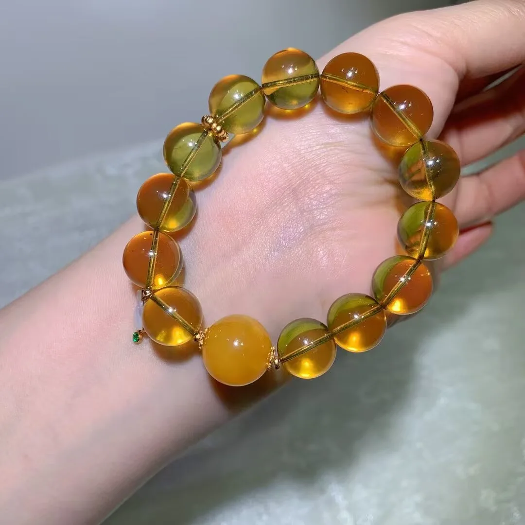 天然蓝珀手链(蜜橙大圆珠与小兔坠 · 13.7mm)