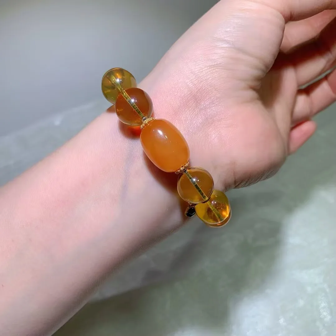 天然藍珀手鍊(橙色大橢圓珠 · 14.3mm) — 細節圖
