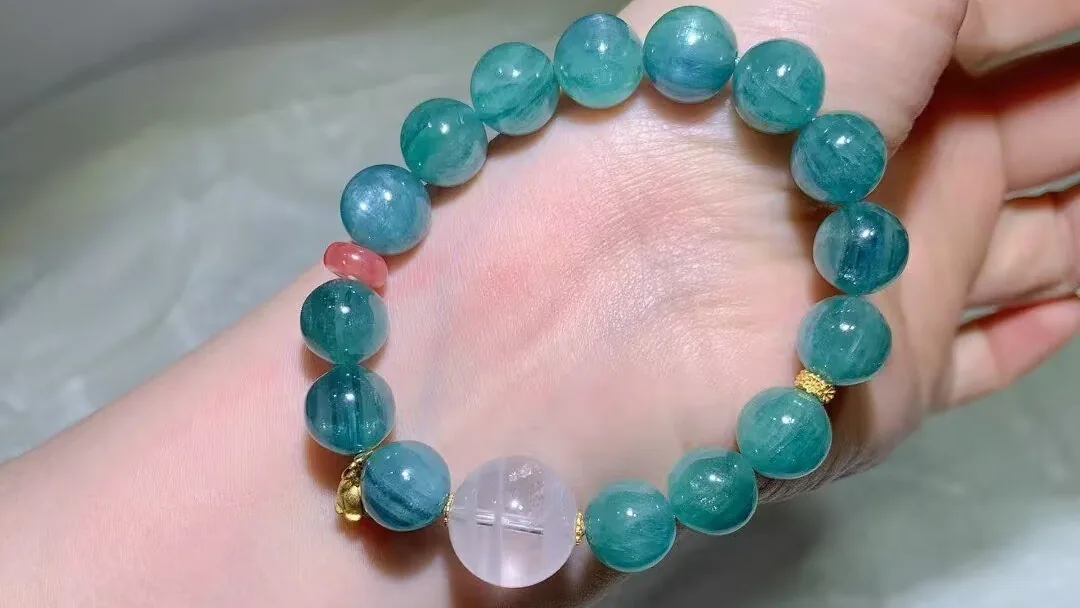 Natural blue-green crystal bracelet with teal and ocean blue-green beads