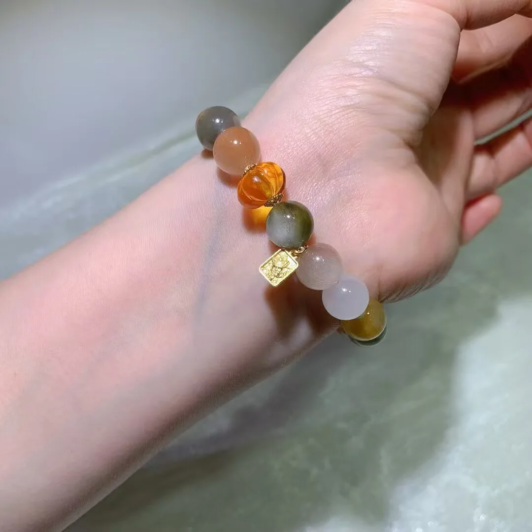 Cat's Eye Multicolor Rabbit Hair Quartz Bracelet · Carved Melon Bead & Tag Charm · 11.2mm — detail photo