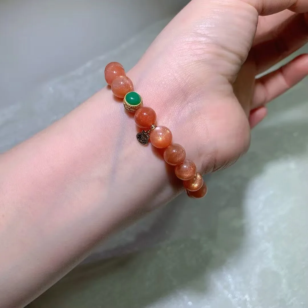Golden Sunstone Bracelet · Green Inlay Bead & Small Charm · 9mm — detail photo