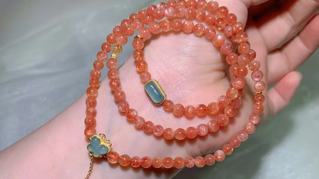 Natural golden sunstone strawberry quartz multi-wrap bracelet with peachy beads full of golden flecks