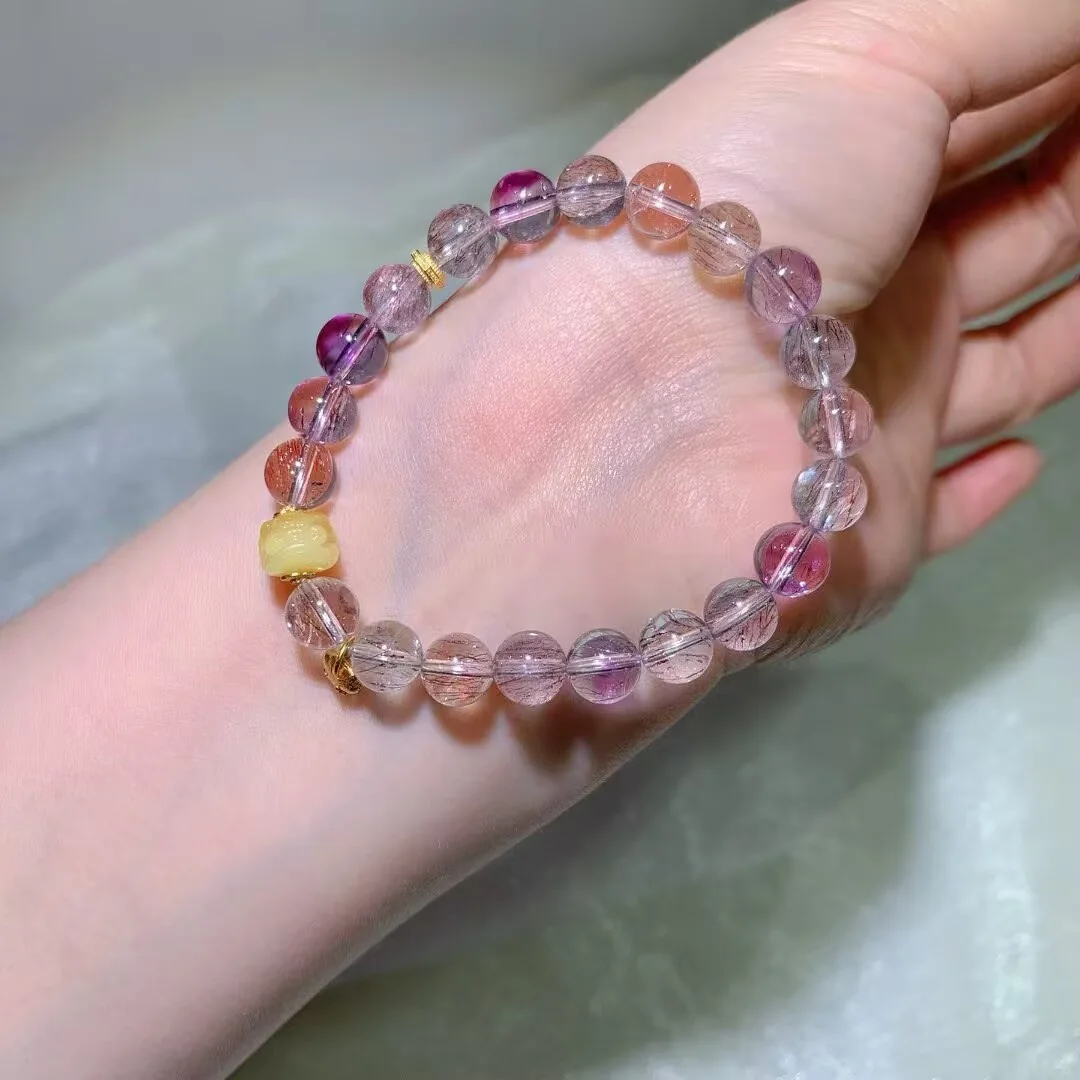 Super Seven Bracelet · Carved Honey-Yellow Bead · 8.2mm — detail photo